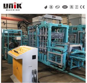 Machine de fabrication de blocs de ciment